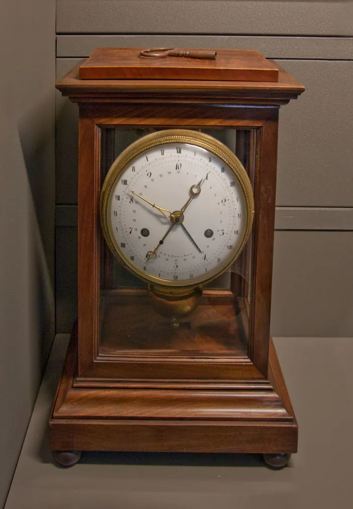 Historical wooden clock with both decimal and conventional time scales